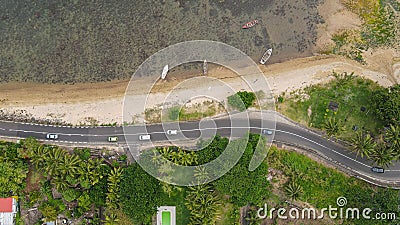 top view from above on an island with roads going through the water Stock Photo