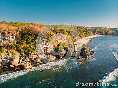 Aerial view of island. Rocks, beach and ocean in Bali, Indonesia. Stock Photo