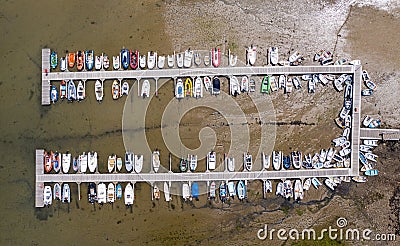 Aerial view of Jetty full of boats and dinghy Stock Photo