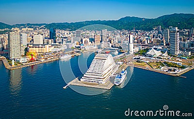 Aerial view of Kobe Port Tower under construction and downtown Sannomiya Stock Photo