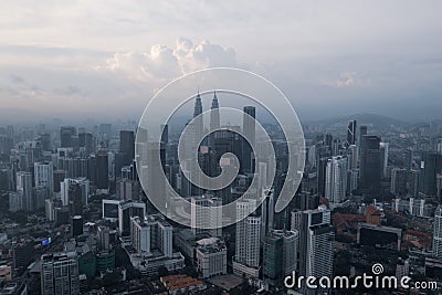 Aerial view of Kuala Lumpur city skyline during cloudy day Editorial Stock Photo