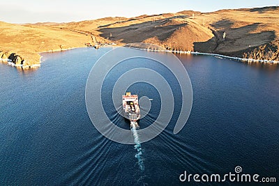 The ferry transports passengers to the island of Olkhon. Stock Photo