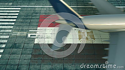 Aerial view of a landing airliner and flag of Egypt on the airfield of an airport. Air travel related conceptual 3D Stock Photo