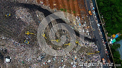 Aerial View. Large landfills like mountains. the tractor take garbage on landfills at Bekasi - Indonesia Stock Photo