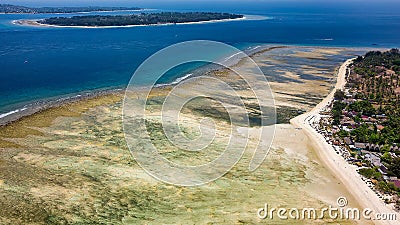 Aerial view of a large reef flat (table) of a fringing coral reef in Indonesia Stock Photo