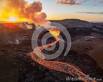 Aerial view of lava pouring out of an erupting volcano in Iceland Stock Photo