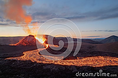 Aerial view of lava pouring out of an erupting volcano in Iceland Stock Photo