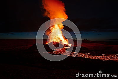 Aerial view of lava pouring out of an erupting volcano in Iceland Stock Photo