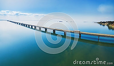 Aerial view of a long highway bridge above a river. Stock Photo