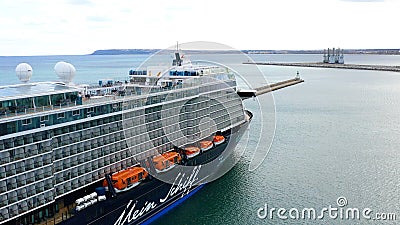 Aerial view of a luxury cruise docked in the port of Alicante, Spain. Editorial Stock Photo
