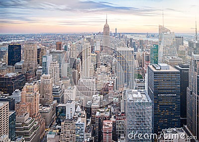 Aerial view of Manhattan skyline, skyscraper in New York City at sunset in evening Stock Photo