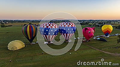 Aerial View on Two Hot Air Balloons Launching, in the Early Morning, From a Field in Rural America Editorial Stock Photo