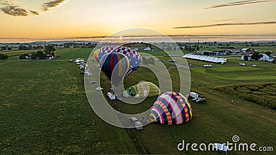 Aerial View on Two Hot Air Balloons Launching, in the Early Morning, From a Field in Rural America Editorial Stock Photo