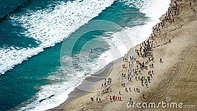 Aerial view of a marathon across the beach. From the top of Mount Maunganui Tauranga, Bay of Plenty. New Zealand. Stock Photo