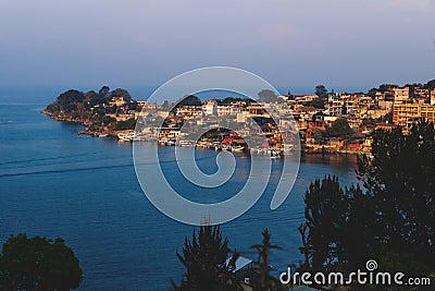 Aerial view on Mayan village along lake Atitlan during sunset, San Pedro la Laguna, Guatemala Stock Photo