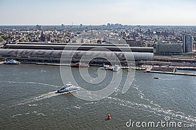 Aerial view medieval city Amsterdam with harbor central railway station Stock Photo