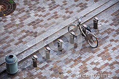 Aerial view. Modern small cobbled square with parking bikes, bic Editorial Stock Photo