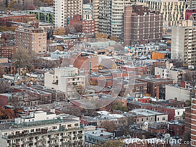 Aerial view of Montreal with a focus of the beginning of Le Plateau district with its distinctive American red bricks buildings Editorial Stock Photo