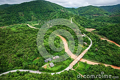 Aerial view of mountain road and river in rainy season Editorial Stock Photo