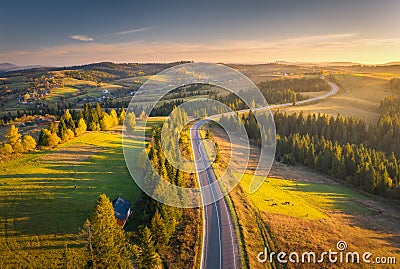 Aerial view of mountain road in village at sunset in autumn Stock Photo