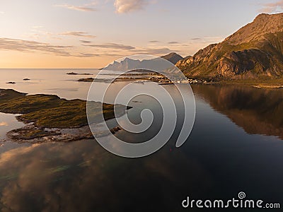 Aerial view of mountains of Lofoten at summer, dusk and clear skies. Cloudscape. Reflections. Summe Stock Photo