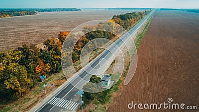 Aerial view of the new road, autumn trees and blue sky Stock Photo