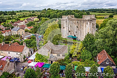 Aerial view of Nunney Castle and Nunney Fayre in Nunney, Somerset, UK Editorial Stock Photo