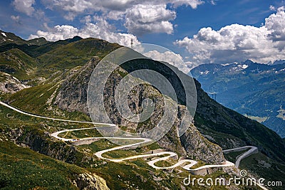 Aerial view of an old road going through the St. Gotthard pass in the Swiss Alps Stock Photo