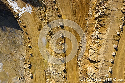 Aerial view of opencast mining quarry with lots of machinery. Industrial place view from above. Photo captured with drone Stock Photo