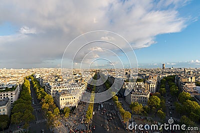 Aerial view of Paris City and the Avenue des Champs-Elysees with a rainbow among the city Stock Photo
