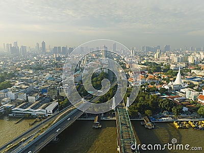 Aerial view of Phra Buddha Yodfa Bridge, Memorial Bridge and Phra Pok Klao Bridge over the Chaophraya River at sunrise scene Stock Photo