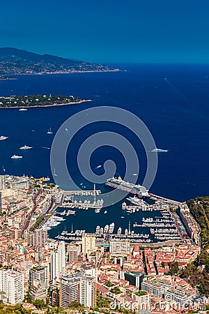 Aerial view of port Hercules of Monaco at sunset, Monte-Carlo, huge cruise ship is moored in marina, view of city life Stock Photo