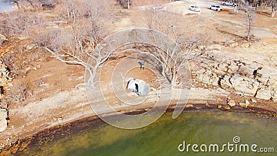 Aerial view primitive camping and fishing trail near trailhead parking at Grapevine Lake, Texas, America Stock Photo