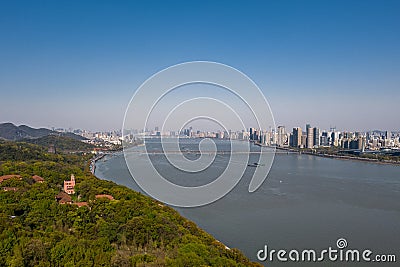 Aerial view of Qiantang River Bridge and modern city skyline in Hangzhou, China Stock Photo