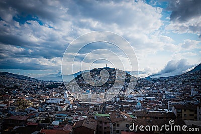 Aerial view of Quito, capital of Ecuador. El Panecillo hill in the middle. Stock Photo