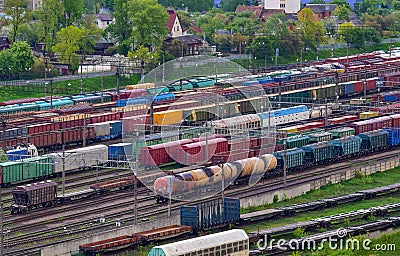 Aerial view of railway yard with freight rail wagons. Cargo trains with goods on railroad. Freight train with petroleum tank cars Stock Photo