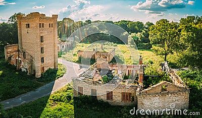 Aerial View Remains Of Yastrzhembsky Estate And Park Complex In Summer Sunset, Sunbeam. Top View Of Old Five-storey Stock Photo