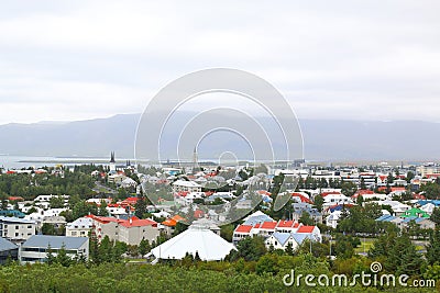 Aerial view of Reykjavik, Iceland with harbor and skyline mountains. Editorial Stock Photo