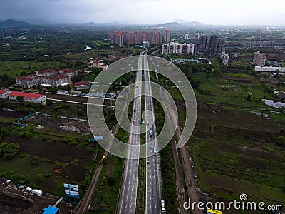 Aerial view of a road with cars with industrial buildings in the background Editorial Stock Photo