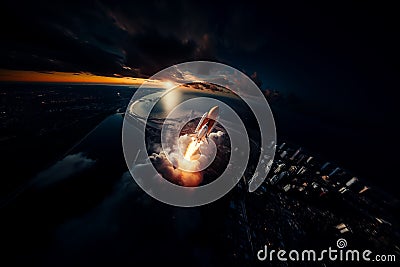 Aerial view of rocket launch at sunrise over ocean coast Stock Photo