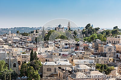 Aerial view of rooftops of buildings in the old city with Abbey of the Dormition of Jerusalem. View from the Lutheran Church of Stock Photo