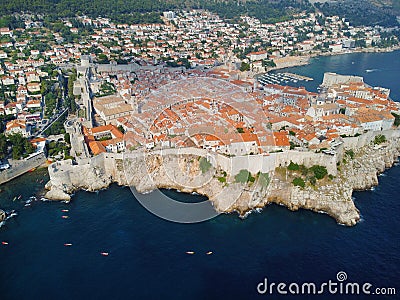 Aerial view of rooftops of Dubrovnik old historical town and Adriatic sea in Croatia. UNESCO World Heritage site, Famous Stock Photo