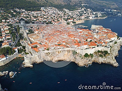 Aerial view of rooftops of Dubrovnik old historical town and Adriatic sea in Croatia. UNESCO World Heritage site, Famous Stock Photo