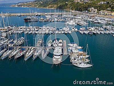 Aerial view of sailboats and moored boats. Boats moored in the port of Vibo Marina, quay, pier. Editorial Stock Photo