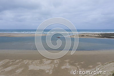 Aerial view of a sand dredger boat at the mouth of the Murray River in South Australia Stock Photo