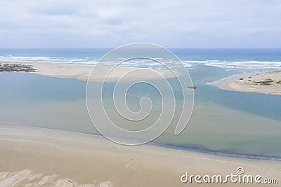 Aerial view of a sand dredger boat at the mouth of the Murray River in South Australia Stock Photo