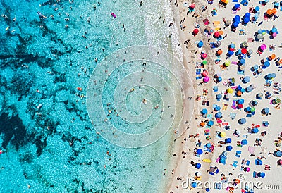 Aerial view of sandy beach with umbrellas and sea Editorial Stock Photo