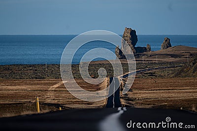 Aerial view of a scenic asphalt road leading to the shore of Snaefellsness, Iceland Stock Photo