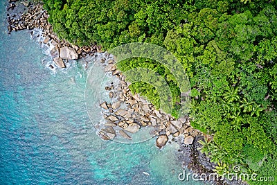 Aerial view of sea and coastine with natural background forming patterns in nature, Praslin Island, Seychelles Stock Photo