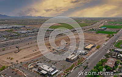 Aerial view of shopping district center and parking lot in Avondale small town a view overlooking desert near on of state capital Stock Photo